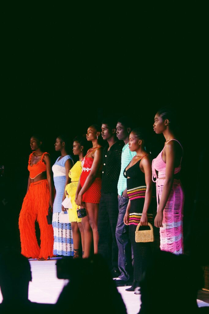 Models showcase vibrant African fashion in a Nigerian runway event.